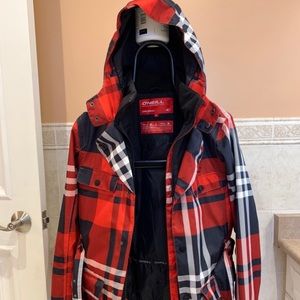 A very stylish women’s O’Neill ski jacket with belt. In excellent condition.